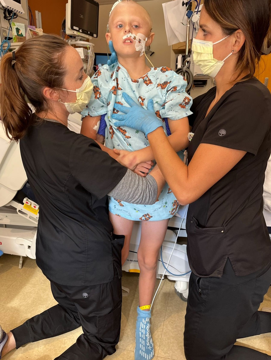 Therapists help William Dean get back on his feet following a brain surgery.