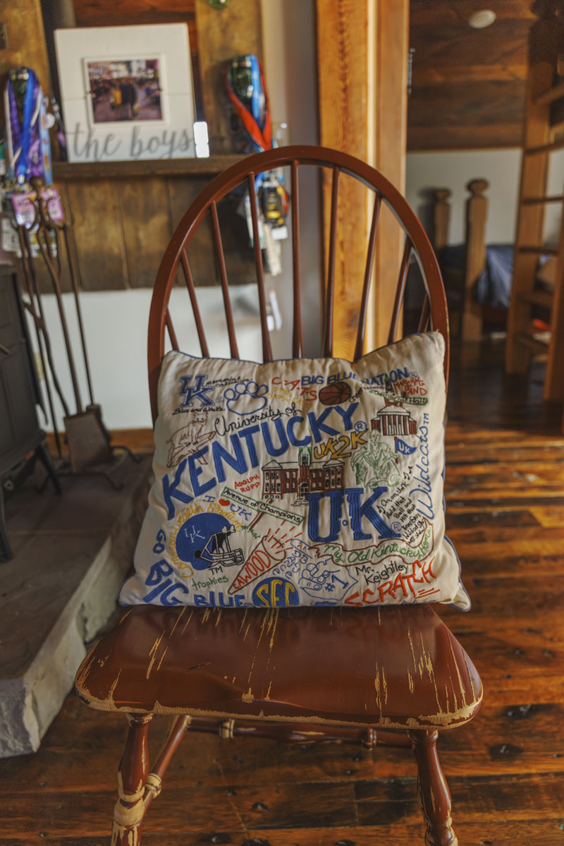 A pillow adorned with University of Kentucky imagery at Bruce's home.