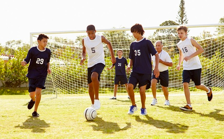 Boys playing soccer