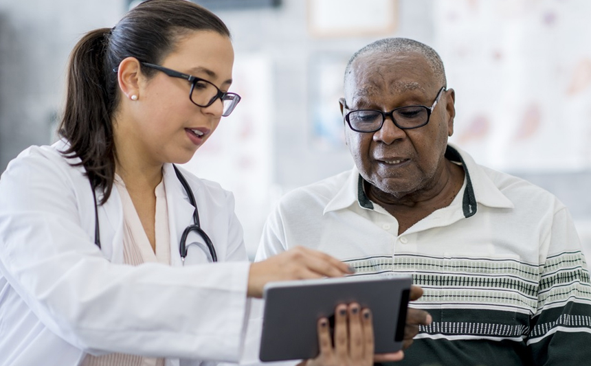 Patient talking with doctor about colorectal screening