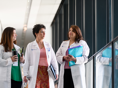 Left to right: Bethany Taylor, RT(R); Liliana Terziyska-Kuvlieva, MD and Omyma Sorour, MD talk.