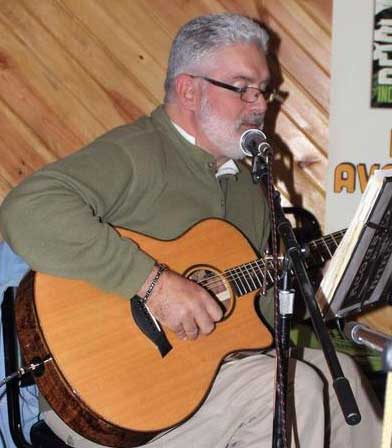 Bruce Smith playing guitar