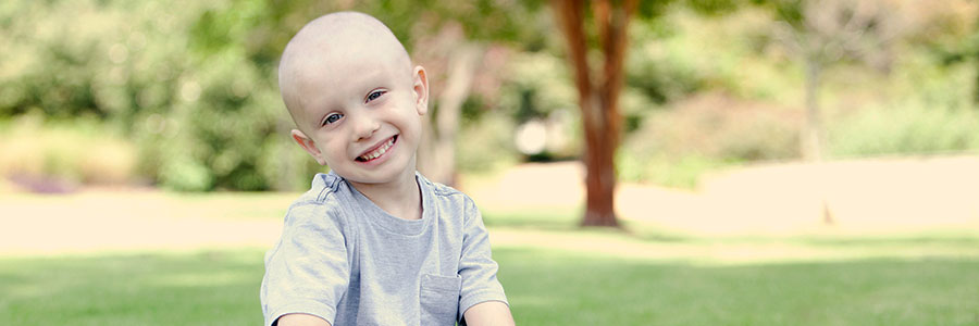 Child smiling in the park