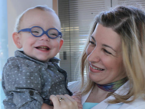 Dr. Ana Ruzic holds Connor Stacy