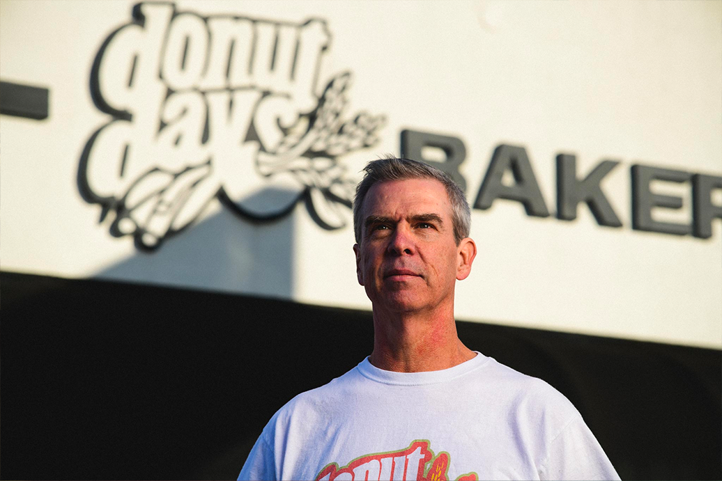 Fred Wohlstein stands in front of his bakery.