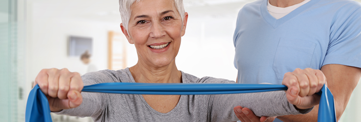 Woman stretching with elastic band