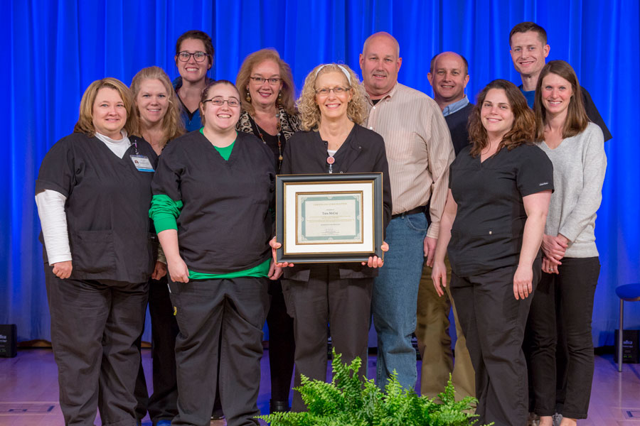 Tara McCoy, PT, with her co-workers