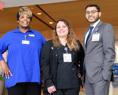 Three UK HealthCare employees.