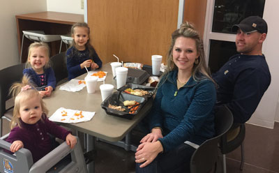The Watts family gathers around a Thanksgiving meal at the hospital to keep a promise and count their blessings.