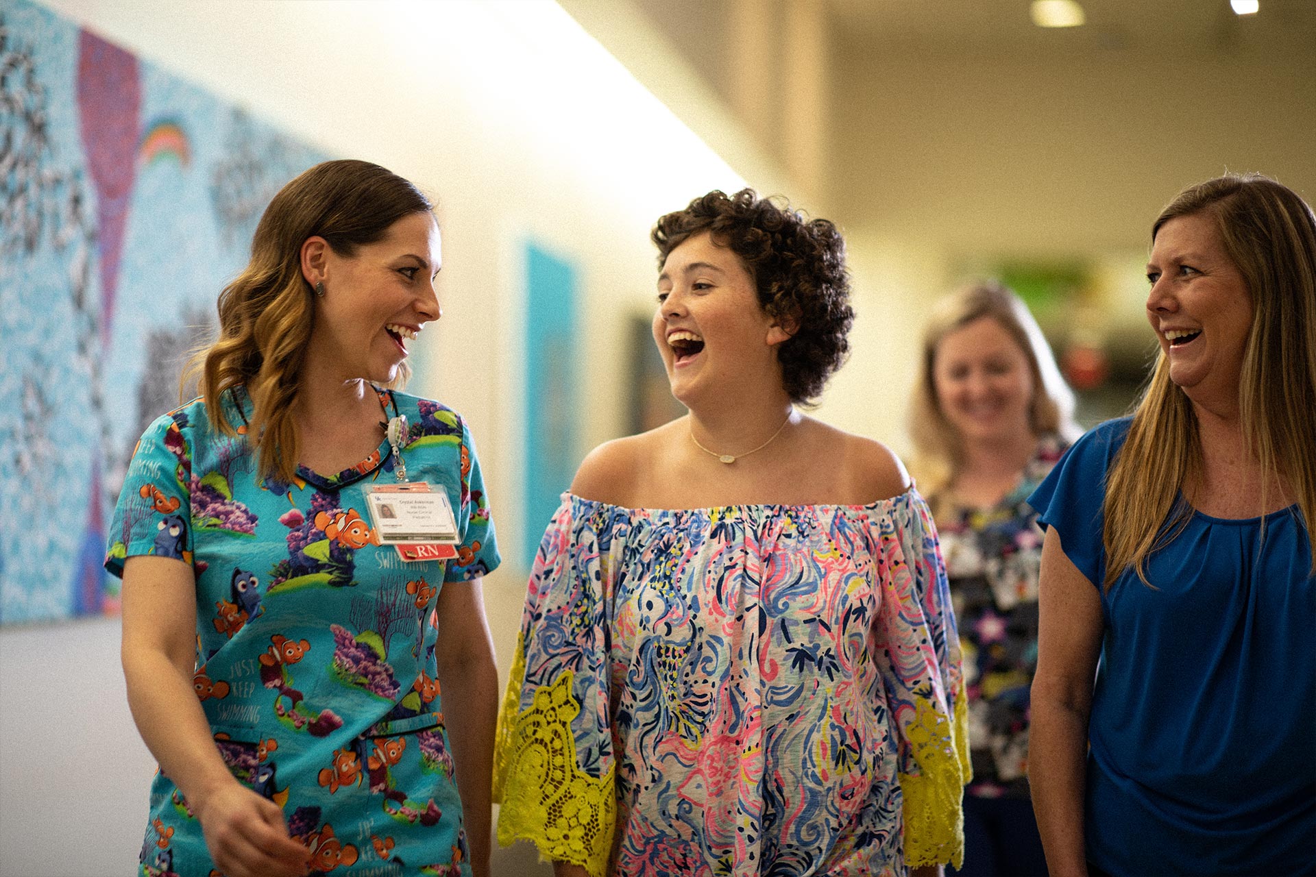 Kylee catches up with her nurses at Kentucky Children’s Hospital after completing her treatment.