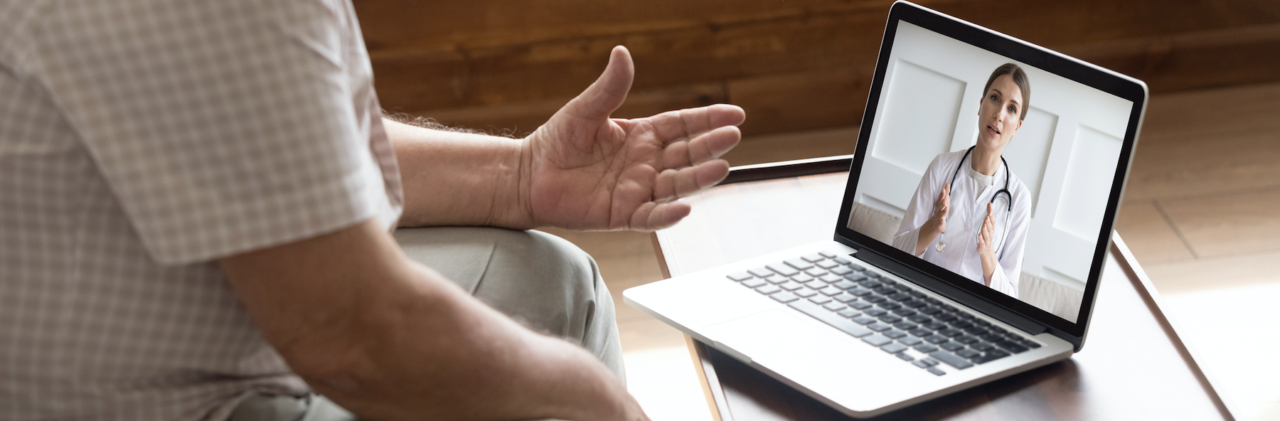 Man seeing doctor through TeleCare.