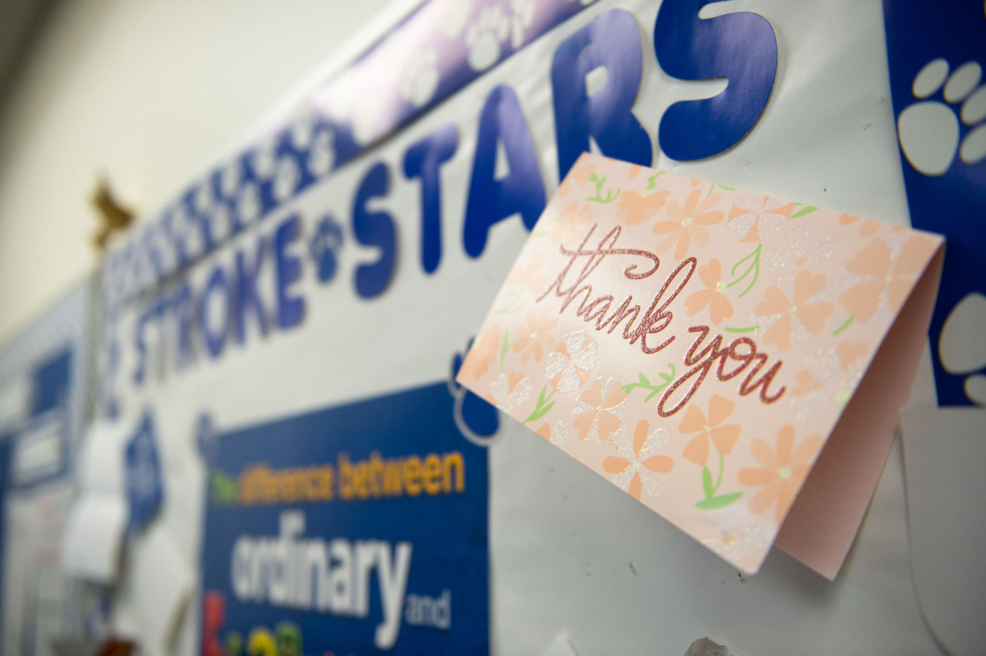 A thank you card taped up to a \
