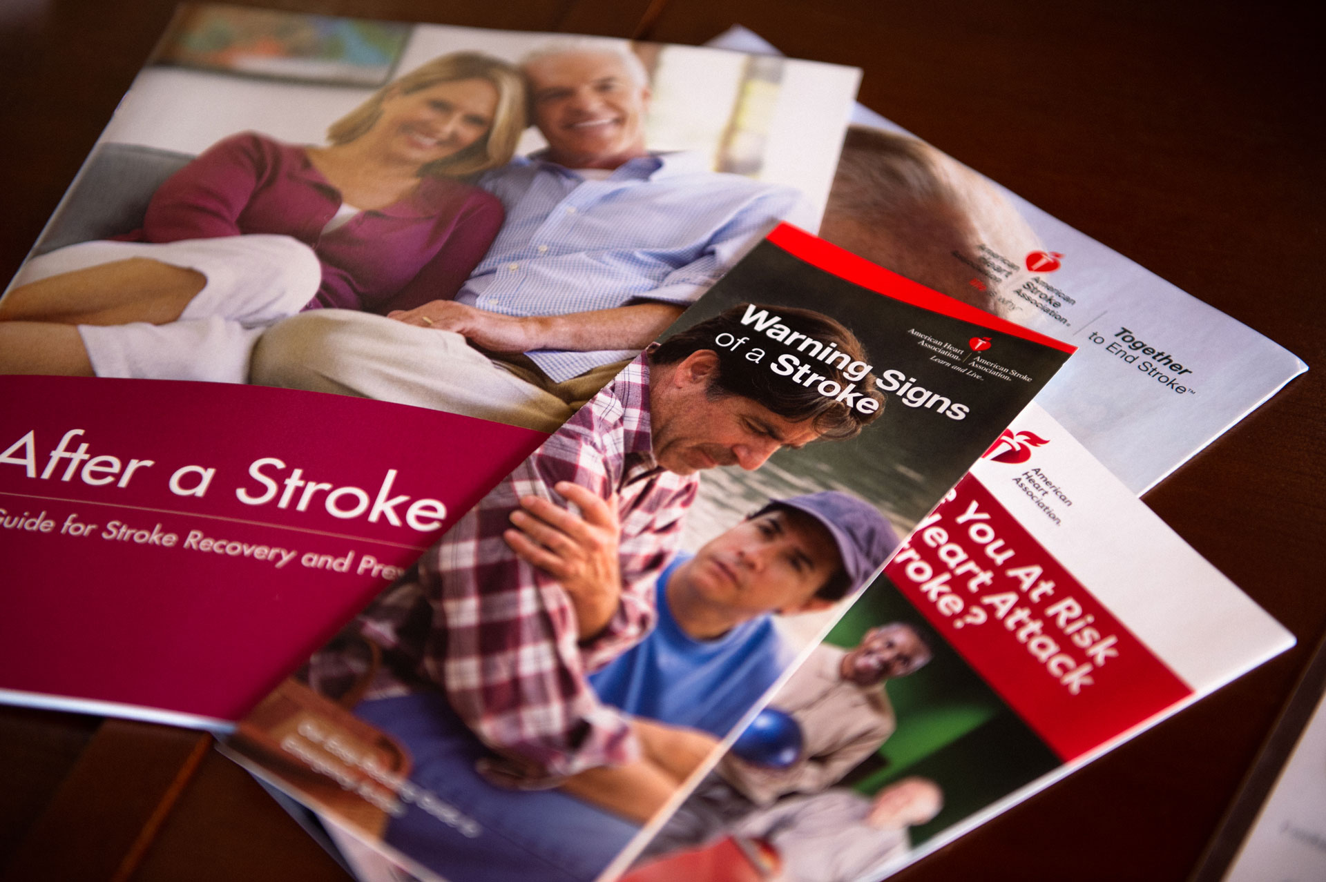 An assortment of pamphlets and booklets about the symptoms of stroke and stroke recovery.
