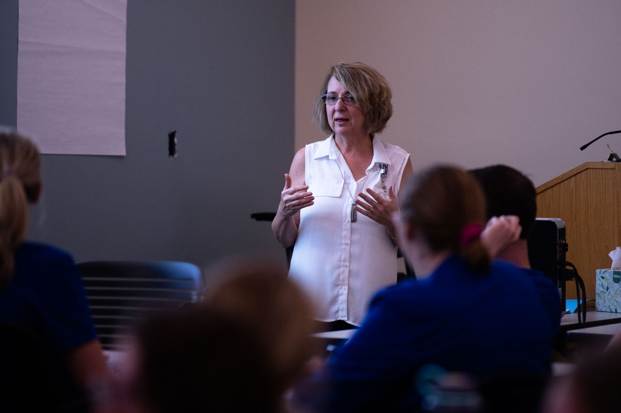 Margie educates a room full of nurses on the symptoms of stroke.
