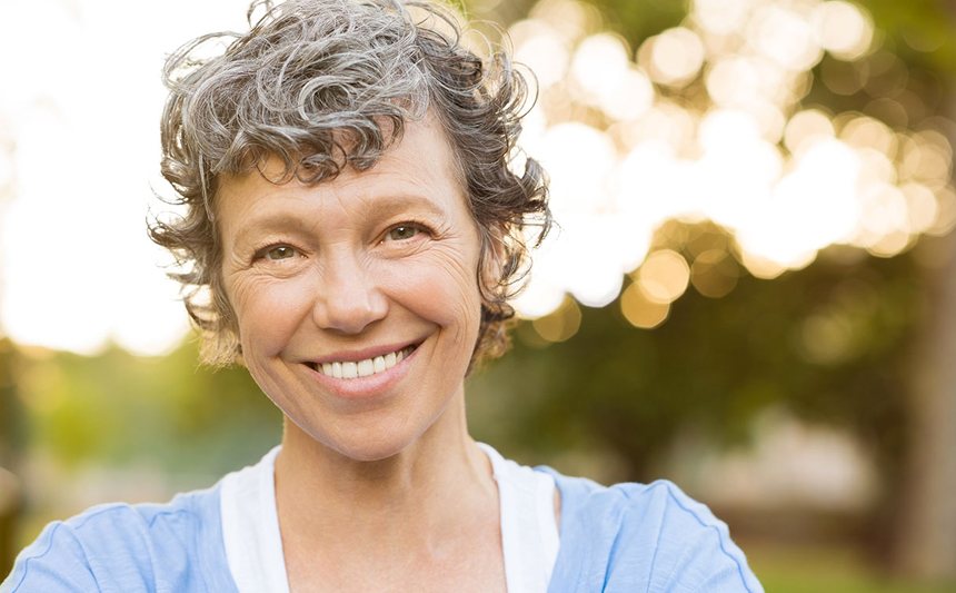 Woman smiling.