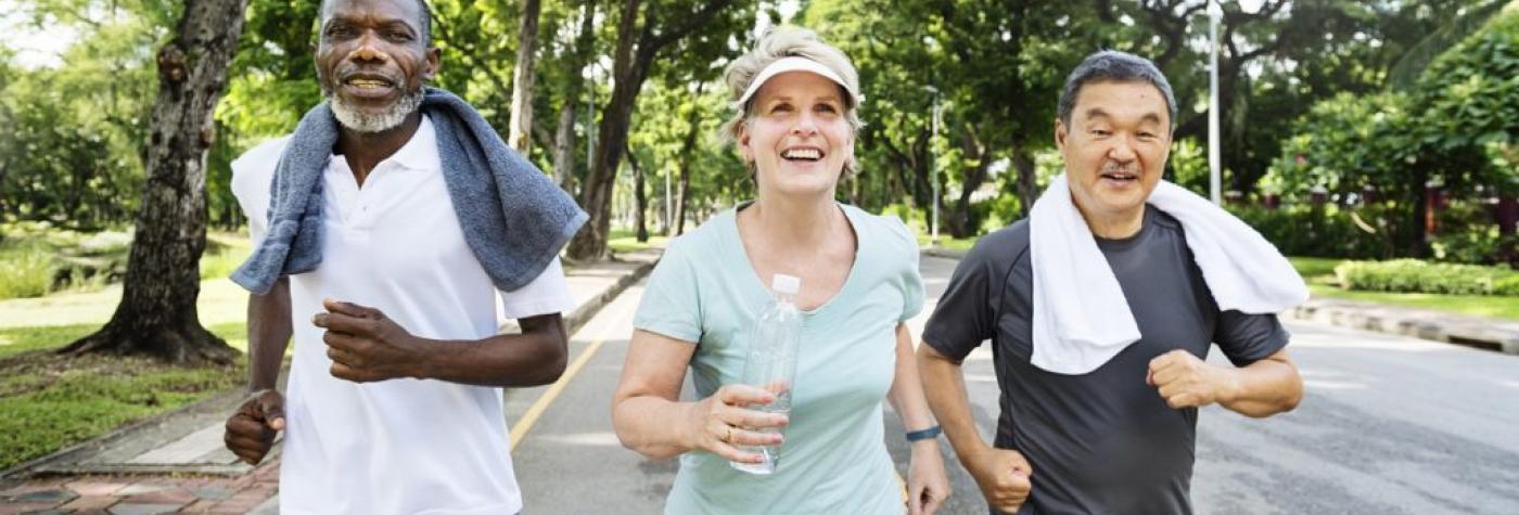 Three people running together