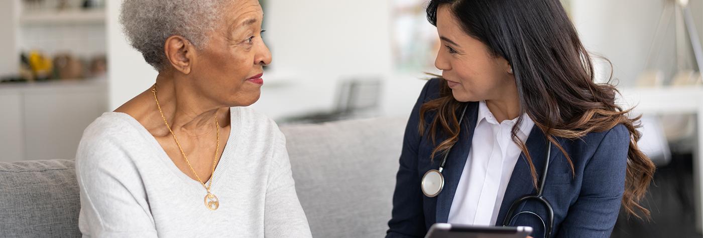 A patient talks with a healthcare provider.