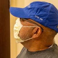 Raymond Cloud wearing a hat that indicates he was the 468th lung transplant patient at UK HealthCare.