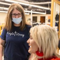 Kayla Lacy's mother looks at her daughter while at therapy