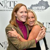 Lindi hugs Dr. Susanne Arnold, who monitors Lindi’s ongoing care, at a Unite to Fight event for Breath of Hope Kentucky.