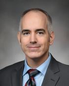 James A. Troy, MD