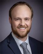 Curtis J. Koons, Jr., MD